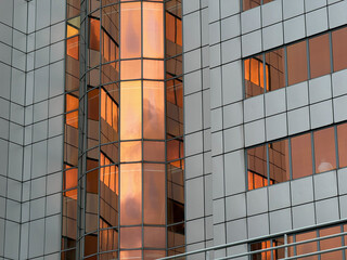 Modern Building with Reflective Orange-Tinted Windows