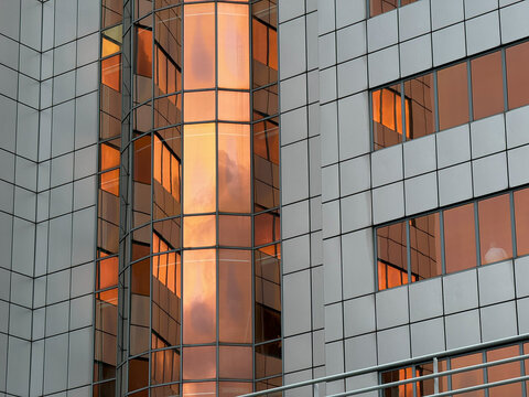 Modern Building with Reflective Orange-Tinted Windows