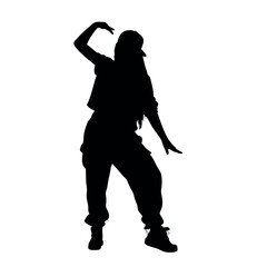 A woman in a black outfit is dancing. She is wearing a hat and has her hands on her hips