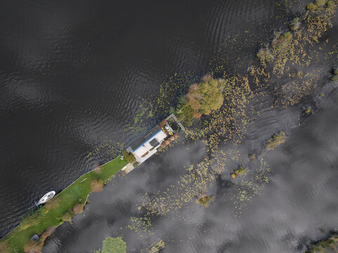 loosdrechtse plassen, water village, house on water, nature of The Netherlands. Breukelen, Scheendijk, aerial drone view.