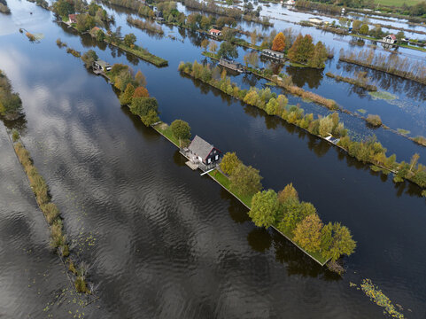 loosdrechtse plassen, water village, house on water, nature of The Netherlands. Breukelen, Scheendijk, aerial drone view.