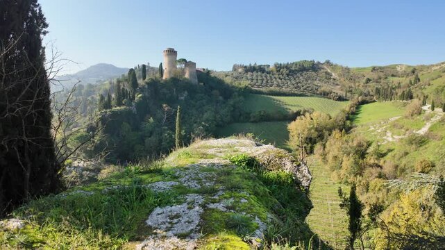 Captivating view of medieval towers in of Brisighella Castle, known as the Rocca Manfrediana in Italy, blending history and nature in picturesque Tuscan romagnolo apennines with Monticino sanctuary