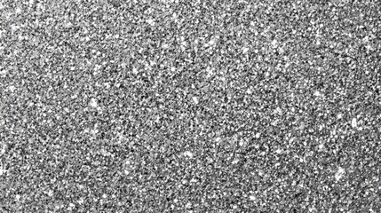 A shiny, glittery surface with many small, shiny, reflective pieces