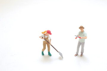 Figurines of Gardeners with Shovel and Scissors