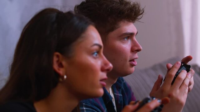 Cute couple gaming together in close up