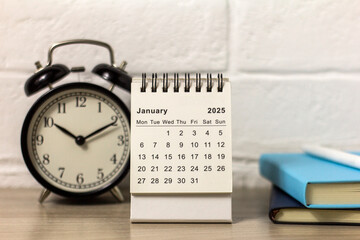 On the table - January 2025. Desk calendar for planning and organizing time.