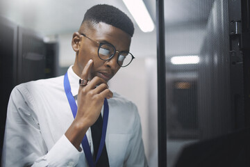 Black man, technician and server room with software or hardware for storage, connection or network...