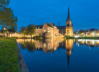 Dutch city of Woerden, view of the St. Bonaventura church and castle of Woerden during blue hour