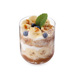 Tasty trifle dessert. Sponge cake, blueberries, banana and whipped cream in glass isolated on white