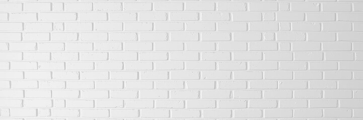 Obraz premium White brick wall with a smooth surface and minimal grout lines, perfect for adding a clean and modern touch to any design project or backdrop, space, background, empty