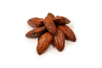 A group of caramelized almonds isolated on a white background.