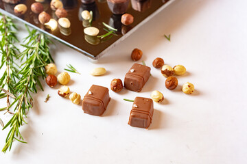 Assortment of chocolate candies sweets isolated on white background