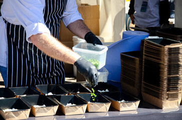 Close-up of the process of cooking food in an outdoor open kitchen