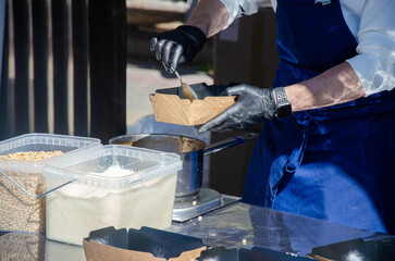 Close-up of the process of cooking food in an outdoor open kitchen