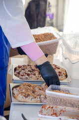Close-up of the process of cooking food in an outdoor open kitchen