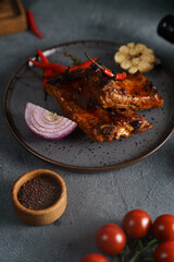 grilled juicy ribs with vegetables
