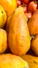 Whole Papaya Fruit: Tropical Sweetness in Vibrant Yellow orange