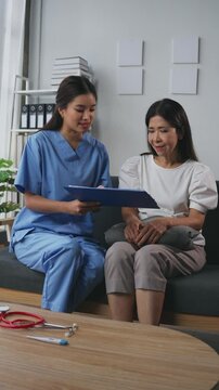Female doctor explaining treatment options to a patient in a caring and professional manner during a consultation