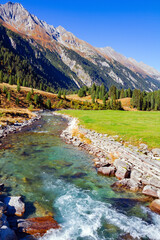 Austrian Alps. Stream of melted water