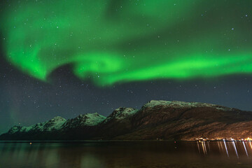 Aurora borealis over the mountains.