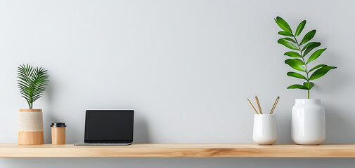 Enhance your workspace aesthetic with minimalist plant decor and modern technology