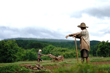 farmer in field with tractor
