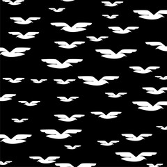 Fototapeta premium Birds in flight Seamless pattern isolated on black background