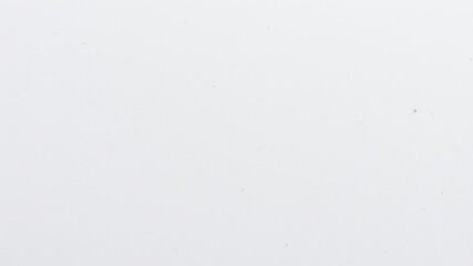 White paper texture background with rough, fibrous surface and subtle speckles, close-up, empty, rough