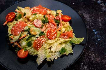 Fresh Mixed Green Salad with Salmon and Cherry Tomatoes