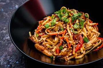 Asian Stir-Fried Noodles with Vegetables and Sesame Seeds
