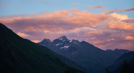 Mountain peaks in Georgia at sunset. Natural beauty. The time of the year is summer