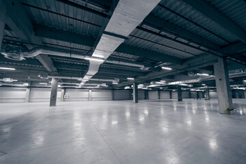 Spacious Industrial Interior with Ductwork and Lighting