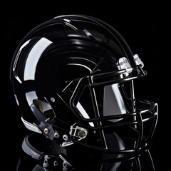 Obraz premium Glossy black American football helmet with sleek design, showcasing its ultra smooth finish and modern features. Perfect for sports enthusiasts and collectors