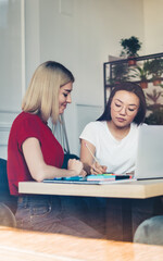 Serious student explaining university project at workplace