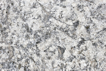 Mineral grain texture with distressed noise pattern. Marble and granite surface background. Macro structure effect for graphic design projects. Gray rock backdrop. Stone closeup.