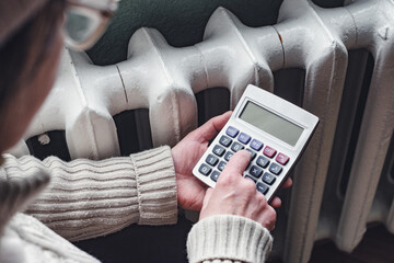 Concept of payment for heating, increase in heating prices. Concept of energy crisis. Concept of high heating costs due to energy crisis.