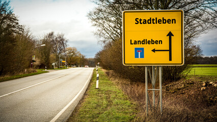 Signposts the direct way to city life versus country life