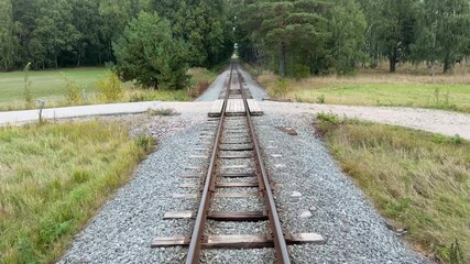 Beautiful view from the back of the moving train, peaceful tour