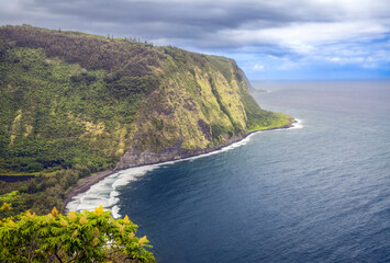 Pacific Ocean waves break on the beach of the Waipo Valley, on the Hamakua Coast of the Big Island of Hawaii, the boyhood home of Kamehmeha I, the first King of a united Hawaii.