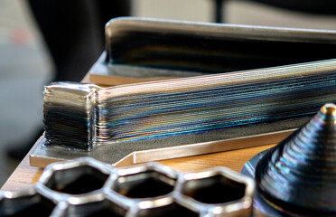 Model printed on 3D printer from metal. Object created on 3D printer from melting metal thread. Modern new technologies. Additive progressive manufacturing solution. Metal 3d printing technology