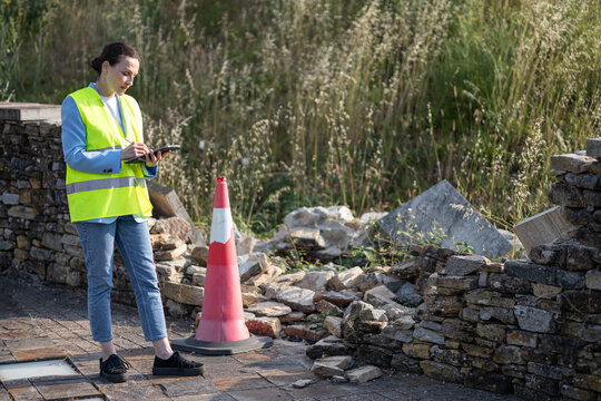 Insurance claims adjuster evaluating damage after incident