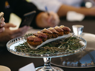smoked croquettes with lamb chops and herbs