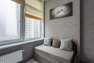 Master bedroom with sliding wardrobe and balcony door. Elegant and comfortable hotel bedroom interior