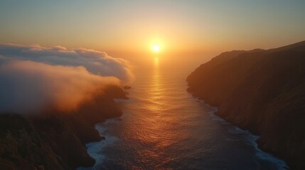 Fototapeta premium Sunset Over a Sea Channel Between Rugged Cliffs