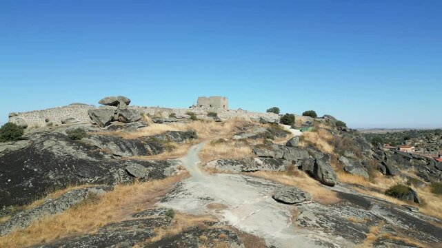Small ruined fortification on top of a hill in a Castilian village in Avila, Miron.
