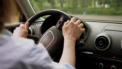 Elderly aged senior Caucasian woman female mature driver owner client grandmother driving automobile steering wheel riding inside car vehicle at city street. Auto rental service insurance dealership