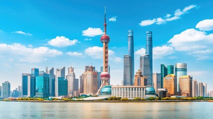 Obraz premium Stunning Skyline of Shanghai with Iconic Tower and Modern Skyscrapers under a Bright Blue Sky and Fluffy Clouds