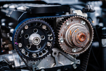 Twin cam engine car with pully wheels and cam belt.The pulley is precision crafted from aluminum and provides precise alignment for perfect engine performance.