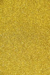 This is a gold colored and glittering background image.