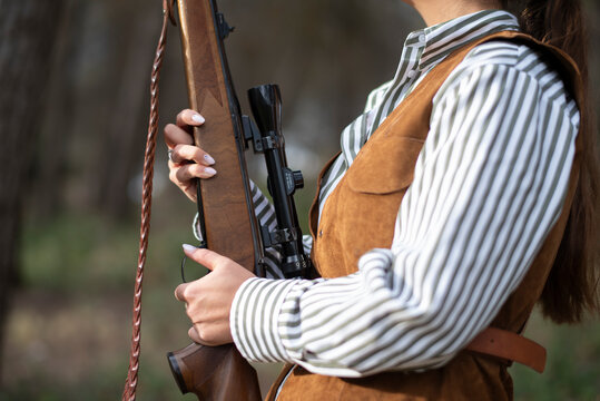 Photographs of a Spanish female hunter in her traditional uniform: Images should NOT be used for anti-hunting campaigns.